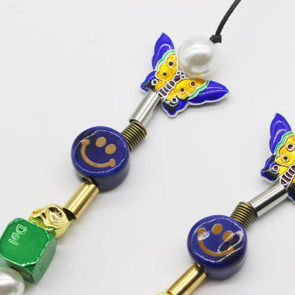 EVAE X CTRLALTDELETE SMILEY SKULL NECKLACE